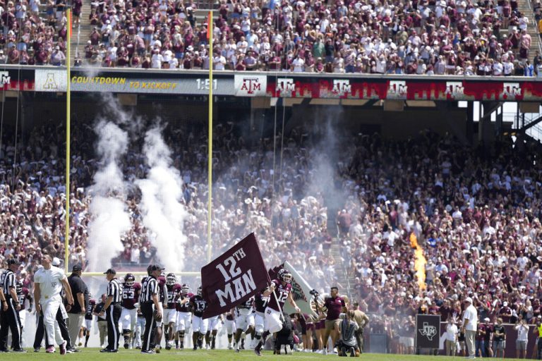 Texas A&M safety Connor Choate (12) leads the Aggies on to Kyle Field before the stat of an NCAA college football game against Appalachian State on Saturday, Sept. 10, 2022, in College Station, Texas.